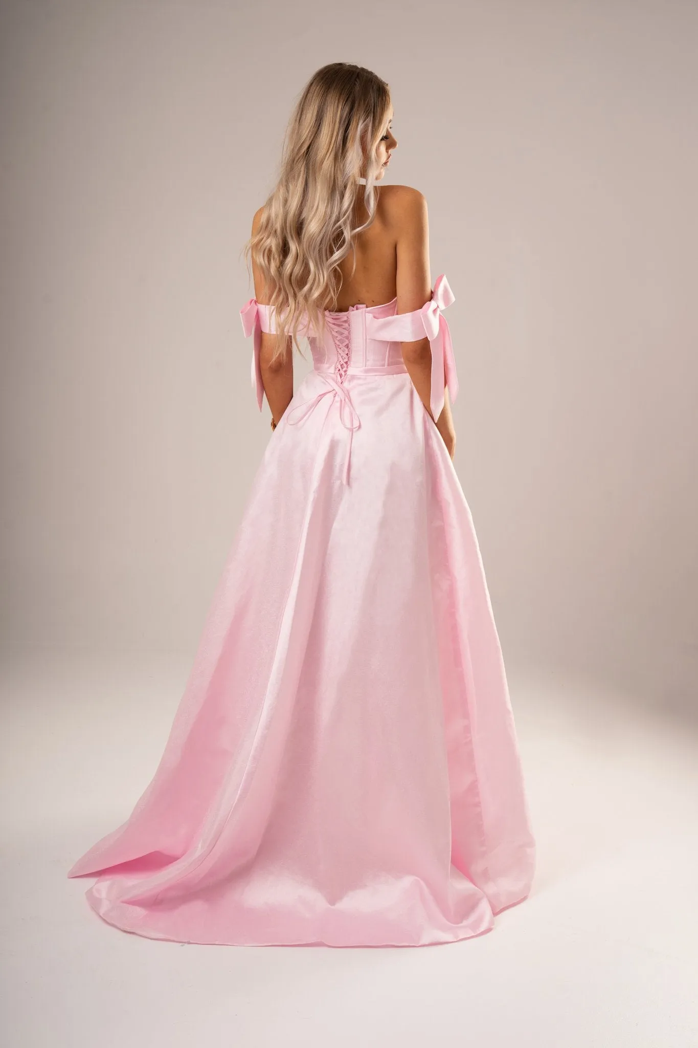 Bustier corset pastel pink dress with bows for hire