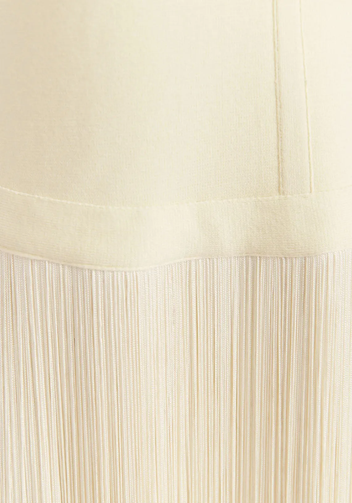 ECRU FLARED KNITTED PANTS